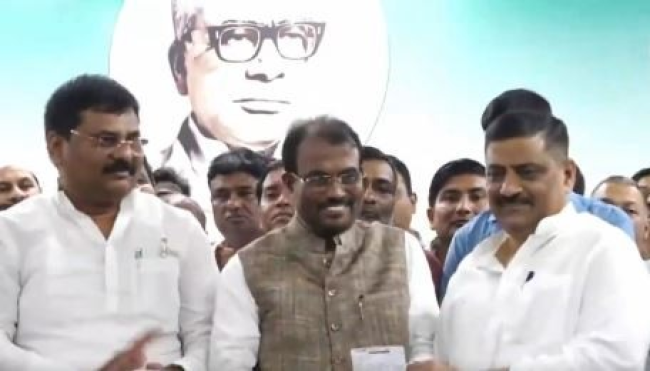 Former Union Minister Shyam Rajak being welcomed into the Janata Dal (United) party at a ceremony in Patna, facilitated by JDU's National Executive President Sanjay Jha