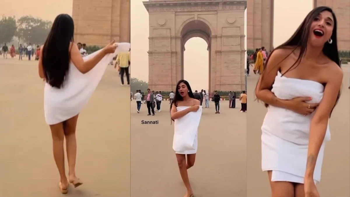 इंडिया गेट पर सफेद टॉवल में डांस करती हुई मॉडल सन्नति मित्रा, सोशल मीडिया पर वायरल।