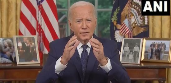Image: President Joe Biden speaking at a podium, with the American flag in the background. Alt text: President Joe Biden addressing the nation about democracy and violence in political discourse.