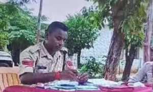 Image of a police officer at Ramnujganj police station, Balarampur, Chhattisgarh